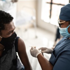 VAD-health-worker-gives-vaccine